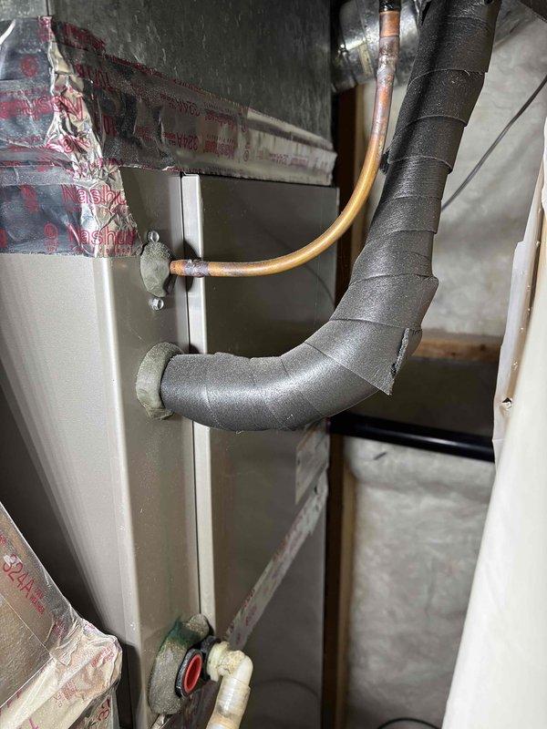 Performed annual cooling maintenance on one air conditioning system operating with 410A refrigerant under 70-degree ambient conditions. Completed comprehensive inspection of indoor air handler including thermostat verification, filter check, blower motor assessment, and electrical wiring and component evaluation, all found satisfactory. Cleared plugged condensate drain line using nitrogen purge and verified proper drainage operation. Inspected outdoor condensing unit including coil condition, amperage draws on motor, compressor, and contactor, all within acceptable parameters. Identified dual-run capacitor (45+5 MFD) reading outside manufacturer specifications and provided estimate for replacement. Verified refrigerant charge levels and temperature split across evaporator coil, both operating within normal range. System restored to full operational status at completion of maintenance service.