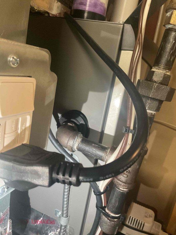 Responded to service call for furnace with blinking red light and access door not staying secured. Upon inspection, determined that blinking light sequence was within normal operating parameters and did not indicate a fault condition. Removed excess insulation padding that was preventing proper door alignment and closure, allowing access panel to fit flush and remain securely fastened to unit.