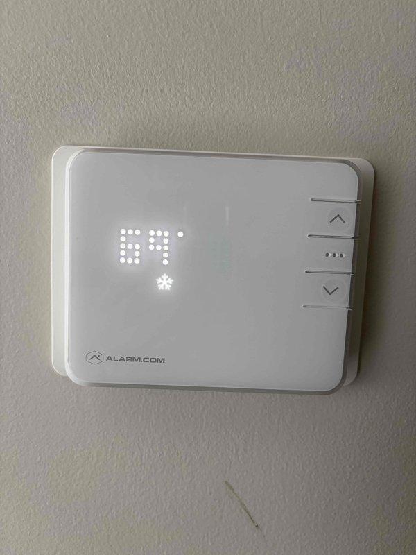 Completed comprehensive preventive maintenance on one-year-old Carrier air conditioning system utilizing 410A refrigerant. Performed thorough inspection of indoor air handler including air filter, condensate drain line, blower motor assembly, and all electrical wiring and components. Verified proper operation of Alarm.com thermostat set to cooling mode at 67°F. Measured and recorded temperature split across evaporator coil, confirming adequate heat transfer and system performance.

Conducted detailed outdoor unit inspection including condenser coil cleanliness assessment, capacitor testing, and visual examination of all electrical connections. Utilized digital multimeter to measure amp draw on condenser fan motor, compressor, and contactor, verifying all readings within manufacturer specifications. Tested refrigerant charge using industry-standard methods with ambient temperature at 78°F, confirming proper system charge with no leaks detected.

All system components operating within no