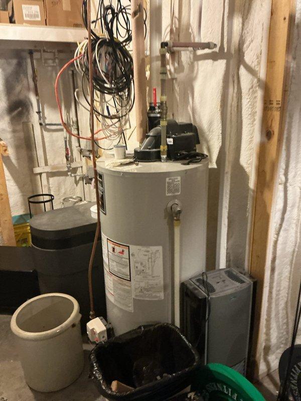 Responded to no cooling call on unit over 10 years old. Upon arrival, found blower motor had failed after customer attempted to lubricate bearings, causing motor to overheat. Motor would start briefly but bearings squealed audibly before seizing and stopping rotation. Replaced failed blower motor and restored system to proper operation.