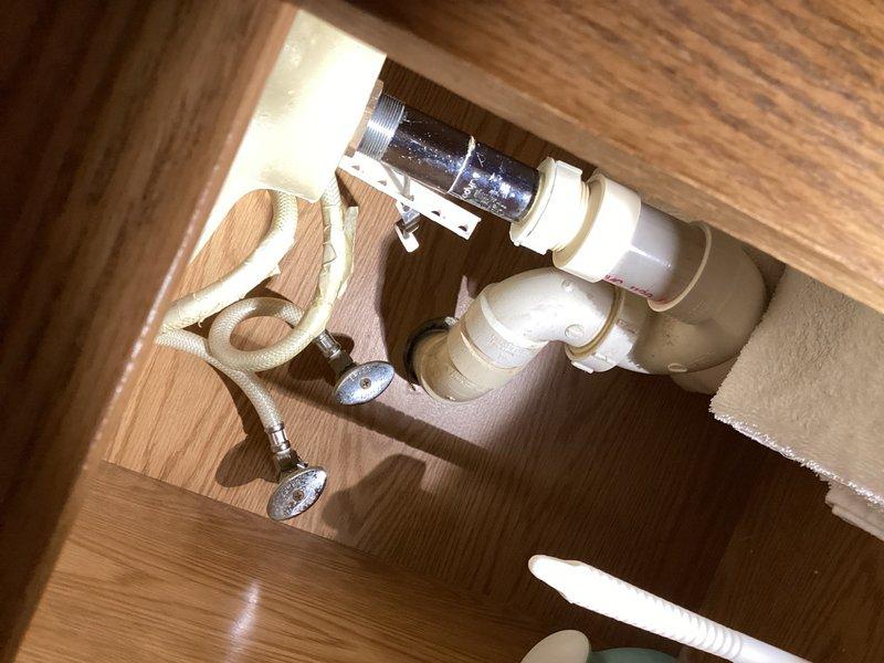 Completed annual member plumbing inspection of residential property. Conducted thorough visual examination of all accessible plumbing fixtures, supply lines, drain assemblies, and shut-off valves throughout the premises. Inspected under-sink plumbing configurations including P-trap assemblies, PVC drain lines, braided flex supply lines, copper tubing, and disposal unit connections. Overall plumbing system found to be in good working condition with proper drainage and no active leaks detected. Noted minor corrosion present on several angle stop valves that should be monitored for potential future replacement. Documented findings with photographic evidence for service records.