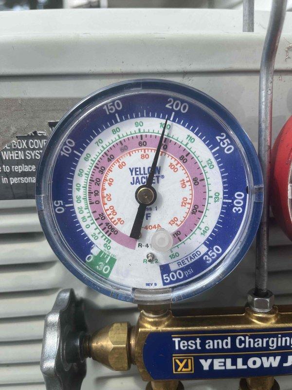 Performed second opinion diagnostic on 23-year-old air conditioning system with reported cooling issues. Isolated the AC unit and conducted pressure test, pressurizing the system and monitoring for leaks. System lost 10 PSI within 15 minutes, confirming active refrigerant leak in the system. Discussed repair options with customer and scheduled follow-up appointment with sales advisor for replacement estimate.