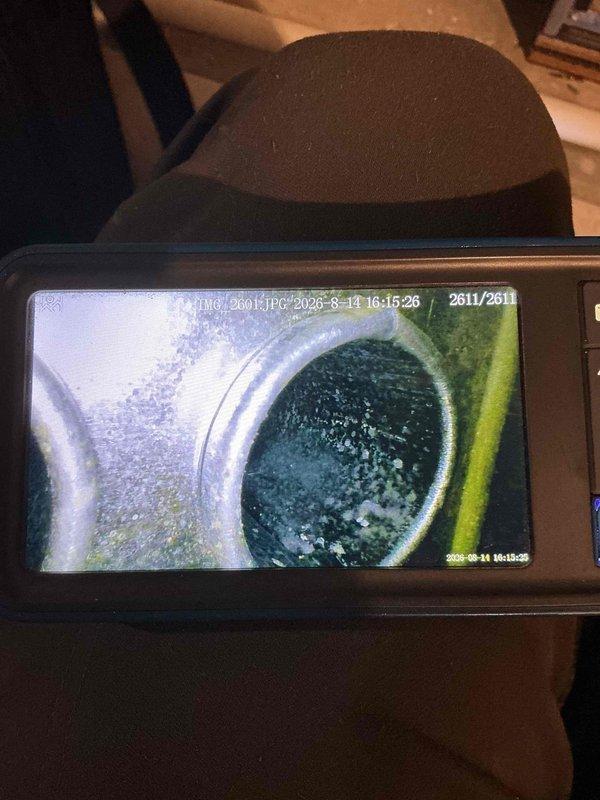 Responded to service call regarding elevated CO2 levels in residence with Lennox HVAC system installed in 2023. Performed comprehensive system inspection including examination of fresh air intake system, exhaust venting configuration, and overall operational status. Utilized inspection camera to evaluate interior condition of venting system and verified proper combustion air supply. System found to be operational with no immediate safety concerns; customer scheduled for follow-up evaluation and indoor air quality assessment to address ventilation requirements.