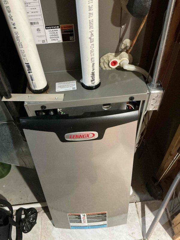 Responded to service call regarding elevated CO2 levels in residence with Lennox HVAC system installed in 2023. Performed comprehensive system inspection including examination of fresh air intake system, exhaust venting configuration, and overall operational status. Utilized inspection camera to evaluate interior condition of venting system and verified proper combustion air supply. System found to be operational with no immediate safety concerns; customer scheduled for follow-up evaluation and indoor air quality assessment to address ventilation requirements.