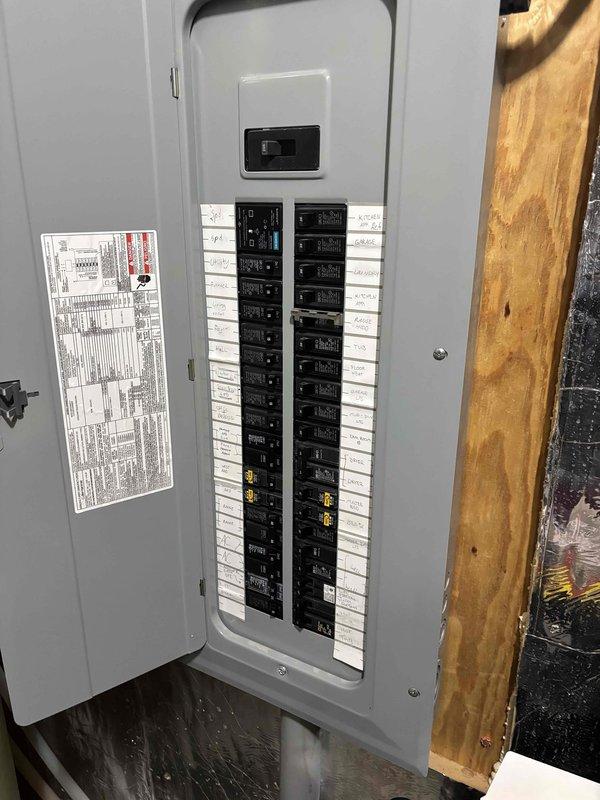 Responded to no cooling call following power outage on one-year-old system. Upon arrival, verified thermostat settings, air handler operation, and filter condition—all satisfactory. Inspected outdoor unit and confirmed contactor engagement with proper 240V and 24V supply. Retrieved error code E414 from AC control board indicating High Discharge Line Temperature Fault. Noted outdoor coil had accumulated dirt and debris. Performed hard reset and successfully restarted system on cooling mode. Verified refrigerant pressures within normal operating range and temperature split acceptable despite dirty coil condition. Cleaned outdoor coil with water rinse to improve heat transfer efficiency. Cycled system multiple times for testing; E414 fault code returned consistently. Consulted with technical support to confirm diagnosis of faulty control board causing false high temperature reading. System operates temporarily after reset but fault recurs, indicating electronic failure rather than mechani