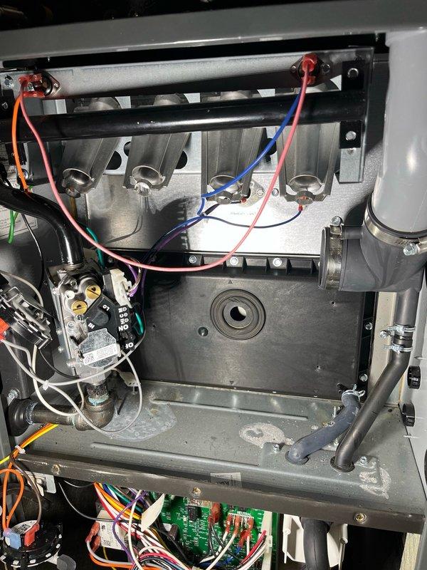 Replaced defective inducer motor on residential furnace under warranty. Removed old motor assembly, installed new unit, verified all electrical connections, and tested system operation. Furnace cycled properly with inducer functioning correctly and all safety controls operating as designed.