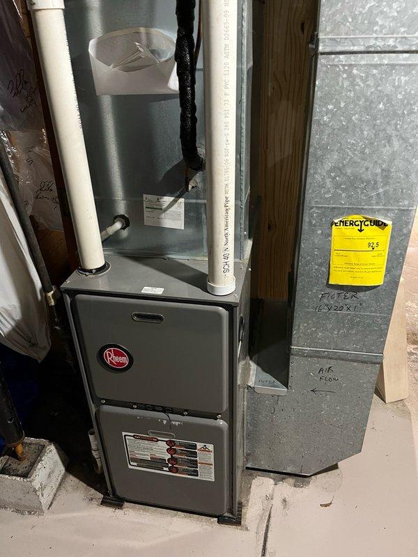 Performed comprehensive air conditioning tune-up on 16-year-old Rheem system as part of Family Rewards preventative maintenance program. Conducted full system inspection including visual examination of furnace, air handler, electrical components, and ductwork connections. Provided replacement air filter (20x25) and verified all components operating within manufacturer specifications with no deficiencies noted. Tested complete AC operation including airflow, electrical connections at breaker panel, and refrigerant cycle performance—all systems functioning properly with no repairs required.