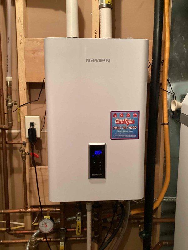 Responded to service call for 12-year-old Navien tankless water heater displaying multiple error codes requiring frequent resets. Upon inspection, diagnosed issue as clogged inlet filter causing pressure-related faults. Removed and thoroughly cleaned the filter assembly, restoring proper water flow and system operation. Unit tested successfully with no error codes present after filter maintenance was completed.