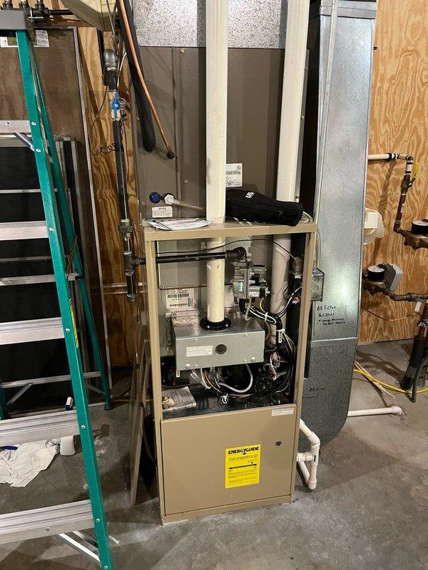 Completed annual AC tune-up on 15+ year old system. Replaced air filter and performed comprehensive inspection of indoor and outdoor units. Blower motor and evaporator coil found clean with proper drainage. Conducted electrical inspection on outdoor unit, confirming all connections secure and condenser coil clean. Ran system for 15 minutes to verify operation, measuring temperature differential exceeding 15 degrees across evaporator coil, indicating proper refrigerant charge and system performance. Identified damper in ductwork connected to humidifier and discussed non-operational humidifier with customer. Recommended scheduling humidifier inspection during fall furnace maintenance, as humidifier operates in conjunction with heating system. All AC components functioning within normal parameters.