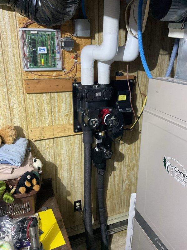 Performed seasonal tune-up and preventive maintenance on geothermal HVAC system for air conditioning operation. Cleaned condensate trap, verified loop pressures and temperatures within specifications, and inspected contactor operation. Capacitor testing revealed readings of 27 and 30 microfarads, which are outside acceptable tolerance range, requiring replacement. Cooling season maintenance completed; heating system inspection scheduled for fall.