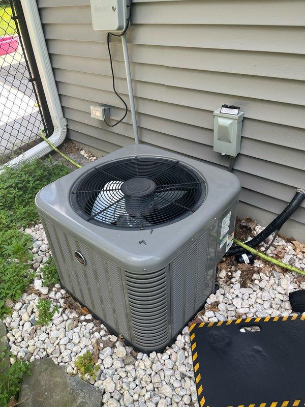 Responded to no cooling callback and found indoor unit operating properly with good airflow, but outdoor condenser completely non-functional. Diagnosed failed dual-run capacitor (40/5 MFD) with failure on both common and fan terminals. Condenser fan motor exhibited elevated temperature and increased bearing resistance, indicating imminent failure. Replaced faulty capacitor and verified system operation with all components functioning correctly. Advised customer that fan motor shows signs of deterioration and recommended obtaining estimate for motor replacement, as current repair serves as temporary solution. Customer approved continuation of service with existing motor and agreed to pursue future motor replacement estimate.