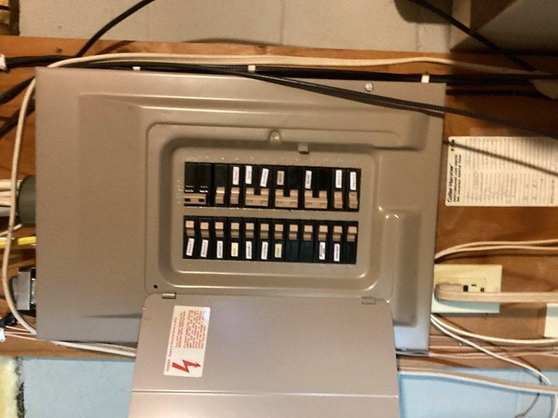 Responded to service call for malfunctioning garbage disposal that had failed over the weekend. Upon inspection, found unit was producing loud, clunky noises and had rusted through the housing. Removed failed disposal unit and installed new InSinkErator replacement, ensuring proper mounting, electrical connections at breaker panel, and plumbing integration with existing PVC drain system and P-trap configuration.
