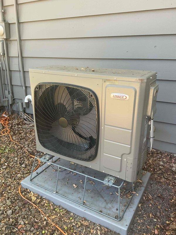 Responded to humidity concern on less than one-year-old Lennox HVAC system. Upon arrival, performed diagnostic evaluation of whole-house humidity levels. Tested system operation and confirmed heating and cooling functions operating normally. Checked thermostat humidity settings and found current setting at 76 percent. After consulting with homeowner regarding comfort preferences, adjusted thermostat humidity setpoint to 80 percent per customer request. Verified HVAC system equipped with Healthy Climate Solutions Carbon Clean 16" air filter (HCF16-16, 16"x25"x5"). Inspected outdoor condenser unit installed on concrete pad against home exterior; unit showing normal operational wear with debris accumulation on top surface. No mechanical deficiencies identified. System operating as designed with adjusted humidity parameters meeting customer requirements.