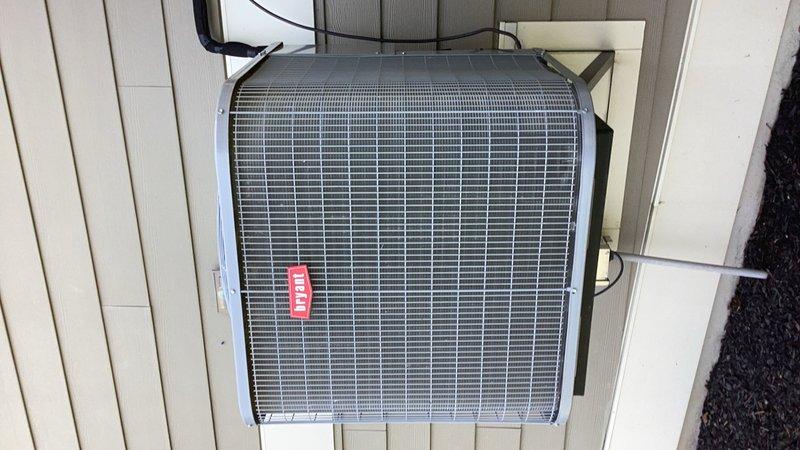 Performed comprehensive air conditioning tune-up and maintenance under membership agreement. Inspected evaporator coil, blower assembly, air filter, condenser unit, condenser coil, contactor, compressor, and all system components. Identified compressor noise during startup and replaced failed capacitor with new unit. Installed hard start kit to assist with compressor startup and reduce mechanical stress. Verified refrigerant charge at proper levels, confirmed condenser coil cleanliness, and tested zone board and damper operation. System restored to normal operation with improved compressor performance.