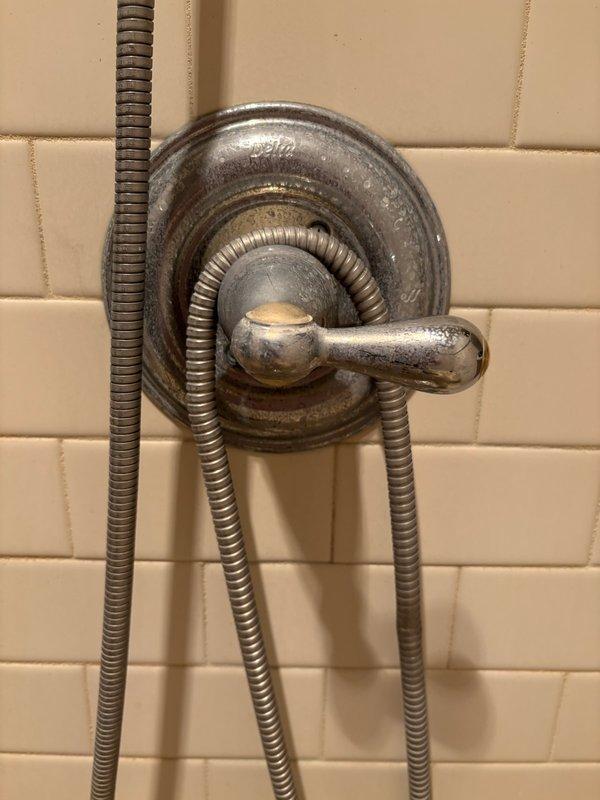 Responded to service call for leaking shower faucet in master bathroom. Upon inspection, identified faulty Delta cartridge as source of leak. Attempted cartridge replacement, but determined shower valve body required full replacement due to internal damage. Successfully removed existing shower valve assembly and installed new shower valve with complete fixture, restoring proper water control and eliminating leak.