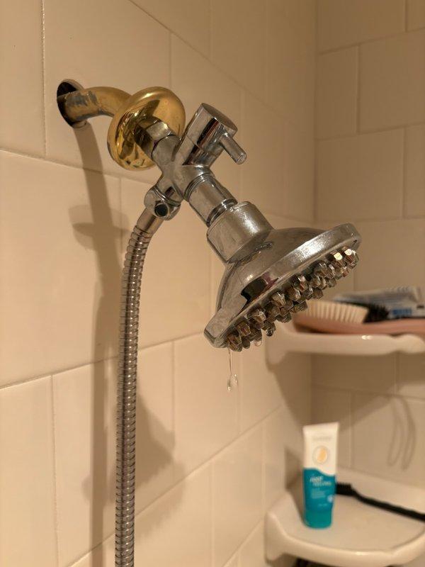 Responded to service call for leaking shower faucet in master bathroom. Upon inspection, identified faulty Delta cartridge as source of leak. Attempted cartridge replacement, but determined shower valve body required full replacement due to internal damage. Successfully removed existing shower valve assembly and installed new shower valve with complete fixture, restoring proper water control and eliminating leak.