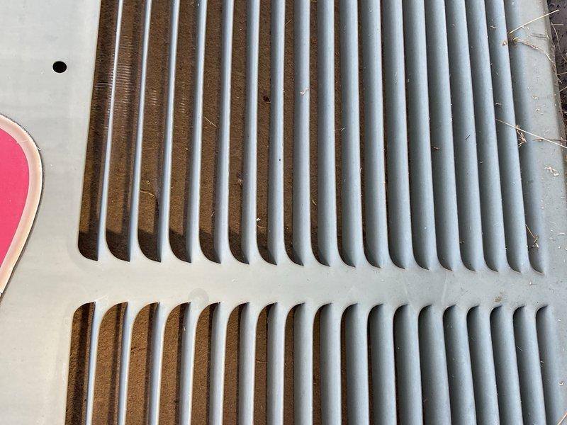 Responded to no-cooling complaint on 10+ year old R-22 air conditioning system. Upon arrival, found severely restricted air filter and outdoor condenser coil heavily blocked with debris, both significantly limiting airflow and heat rejection capacity. Cleaned outdoor unit, thoroughly rinsed condenser coil to restore heat transfer, and addressed airflow restrictions. After cleanup, verified system operation with refrigerant diagnostics showing 22.5°F temperature split, 10.9°F actual superheat against 12.2°F target superheat, confirming proper refrigerant charge and system performance. System restored to normal cooling operation with improved comfort levels.
