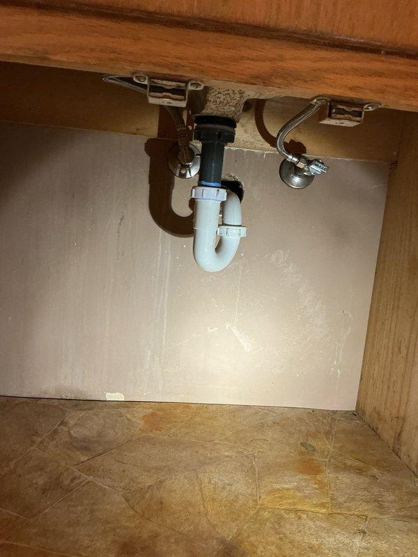 Installed comfort tee and recirculation pump system on tankless water heater to enable hot water circulation throughout the residence. Replaced T-fitting inside the boiler system to accommodate the new recirculator configuration. Installed closet flange for downstairs toilet, securing it properly to the subfloor, and noted that a 10-inch rough-in toilet may be required for proper fit in that bathroom. Tested recirculation system for proper operation and confirmed all components functioning correctly.