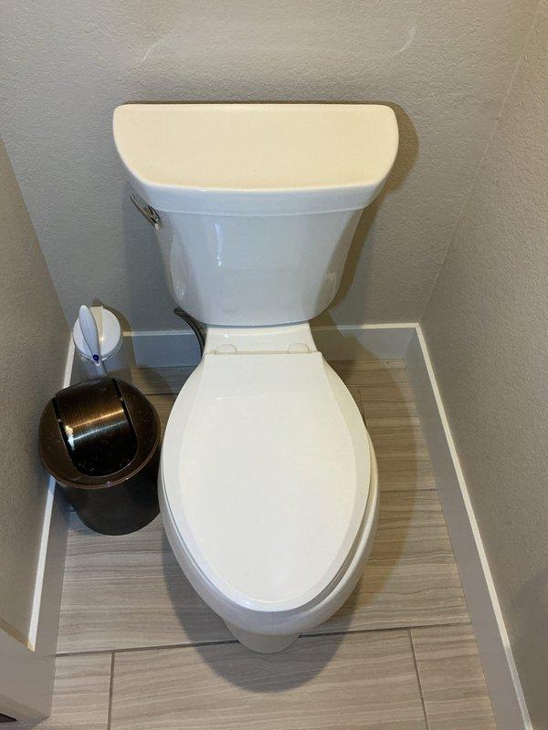 Responded to a toilet leak in the master bathroom caused by a failed tank-to-bowl gasket. Disassembled the toilet tank from the bowl, removed the deteriorated gasket, and installed a new tank-to-bowl gasket to create a proper seal. Reassembled the toilet and verified the repair eliminated the leak.