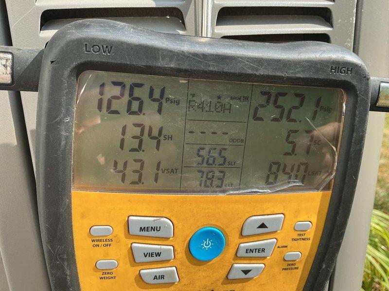 Performed cooling system maintenance on 19-year-old air conditioning unit and identified failing capacitor and contactor, though refrigerant levels remain adequate and system is currently operational. During inspection, discovered critical safety issue: furnace heat exchanger has crack around eyelet in top/right cell past high limit switch, causing carbon monoxide leak during operation. Red-tagged furnace as unsafe to operate and scheduled replacement estimate for both furnace and air conditioning system due to age and condition of equipment.