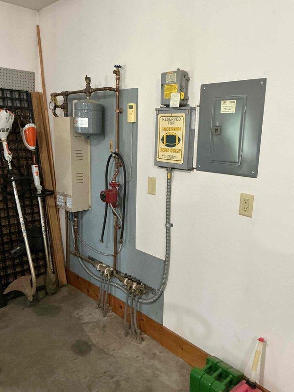 Replaced defective gas regulator on residential Honeywell standby generator under full parts and labor warranty. Installed new regulator, performed leak test on all gas connections, and verified proper gas pressure delivery to unit. All systems tested and operational with no leaks detected. Additionally provided consultation regarding existing boiler system and discussed annual maintenance requirements including system pressurization and water level monitoring.