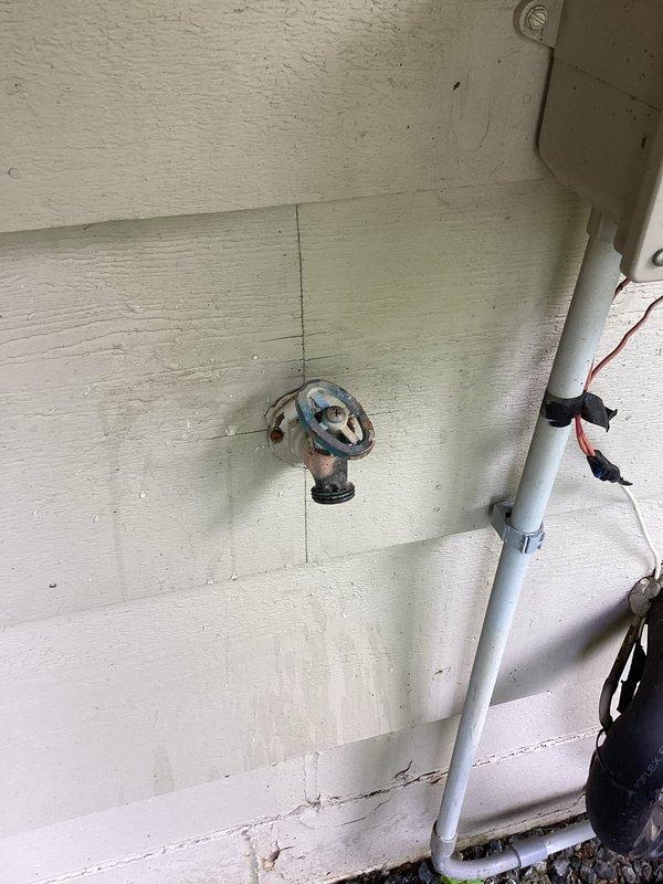 Responded to service call for leaking outdoor hose bib and non-functional laundry valves. Upon inspection, determined the exterior hose bib required full replacement due to leak and the laundry room shut-off valves were seized and inoperable from corrosion. Successfully replaced the outdoor hose bib with new fixture and replaced both corroded laundry valves to restore proper water control functionality.