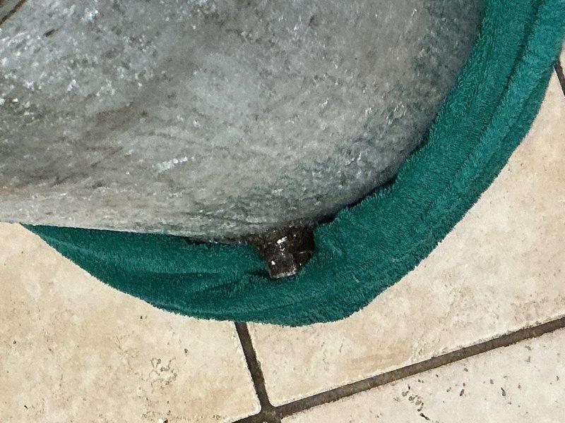 Responded to a slow-draining kitchen sink in a home with original 1970 cast iron plumbing. Upon inspection, identified a partial clog caused by significant grease buildup in the drain line. Successfully snaked the kitchen sink drain using a rigid drain machine, extracting large amounts of accumulated grease and restoring proper drainage flow.