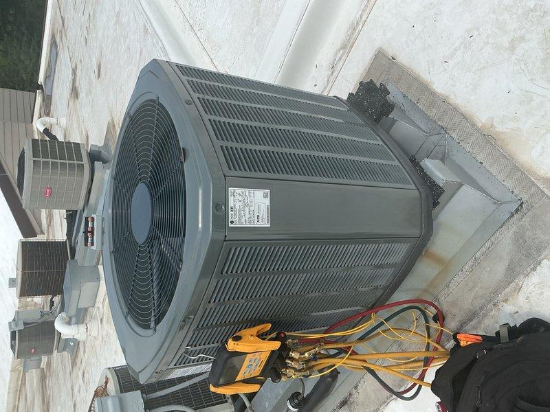 Completed annual cooling maintenance on a 1-year-old rooftop AC system with indoor air handler. Performed comprehensive inspection of capacitor, contactor, electrical wiring, and refrigerant charge levels—all components found to be in good operating condition. Measured supply and return air temperatures with delta-T reading of 18 degrees, confirming proper system performance and cooling efficiency. System is operating within manufacturer specifications and ready for continued seasonal use.