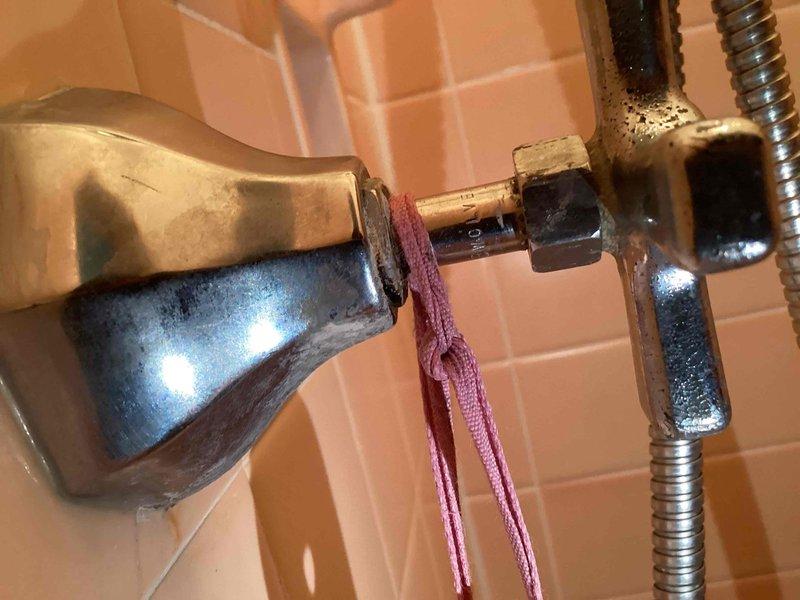 Responded to a residential garbage disposal that was not operating. Upon inspection, determined the unit was seized due to jammed impeller blades. Successfully freed the seized blades using an Allen wrench inserted into the manual rotation socket at the bottom of the disposal unit, restoring full operational functionality to the appliance.