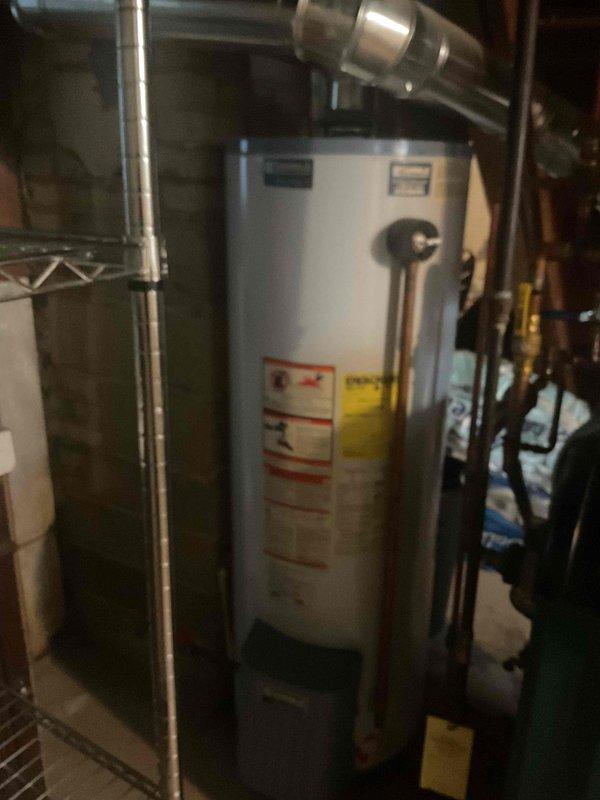 Responded to no-heat call for 15-year-old zoned heating system where upstairs zone was functioning but downstairs zone had no heat. Inspected basement mechanical room containing furnace and water heater equipment, examined ductwork connections, and assessed system components after previous service attempts by another company had failed to resolve the issue. Scheduled follow-up appointment to complete diagnostic testing and necessary repairs to restore heat to affected zone.