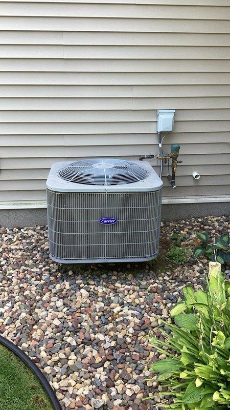 Completed annual cooling system maintenance on 9-year-old Carrier air conditioning unit as part of preventative maintenance agreement. Performed comprehensive system inspection including evaporator coil, blower assembly, condenser unit, contactor, compressor, and all related components. Replaced air filter, verified refrigerant charge levels at proper specifications, and cleaned condenser coil to ensure optimal heat transfer. Measured supply air temperature at 59.9°F, confirming adequate cooling performance. All components operating within normal parameters with no deficiencies noted.