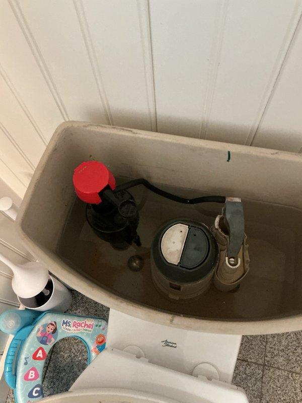 Responded to a service call for a toilet that was running constantly. Upon inspection, determined that the existing American Standard fill valve had failed and was no longer functioning properly. Removed the old fill valve and installed a new replacement unit to restore proper operation. Due to the skirted toilet design, which presents additional complexity for fill valve replacement, advised the customer to monitor the fixture for any potential leaks or drips following the repair.