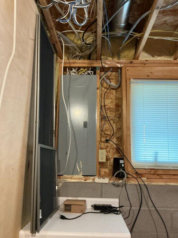 Responded to service call for reported water condensation behind furnace. Upon thorough inspection of HVAC equipment and surrounding area, determined that moisture issue was unrelated to heating or cooling systems. Identified source of water leak as faulty pressure gauge on main water supply line. Documented plumbing components with photos and recommended scheduling licensed plumber to address water line issue.