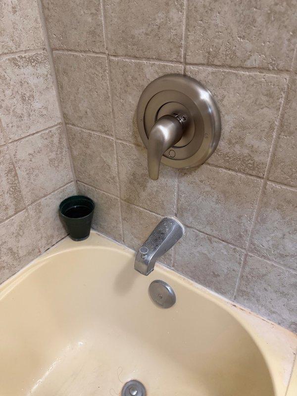 Responded to service call for broken shower handle. Upon inspection, determined the shower cartridge required replacement. Successfully removed the failed cartridge and installed customer-supplied replacement cartridge. Tested the shower valve control handle for proper operation, confirming smooth lever movement and appropriate water flow control. All fixtures restored to full working condition with no leaks detected.