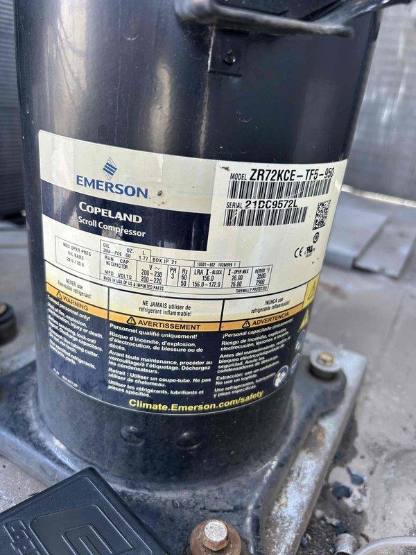 Responded to service call on commercial Bryant rooftop unit and diagnosed failed compressor 1 (Emerson Copeland Scroll Compressor model ZR72KCE-TF5-950). Successfully restored temporary cooling by bringing compressor 2 online while awaiting parts approval for compressor 1 replacement. Completed sold repairs including removal and replacement of plugged liquid line filter drier and replacement of faulty high pressure switch to restore proper refrigerant flow and system protection. Unit operational on single compressor pending authorization for failed compressor replacement and additional required components.