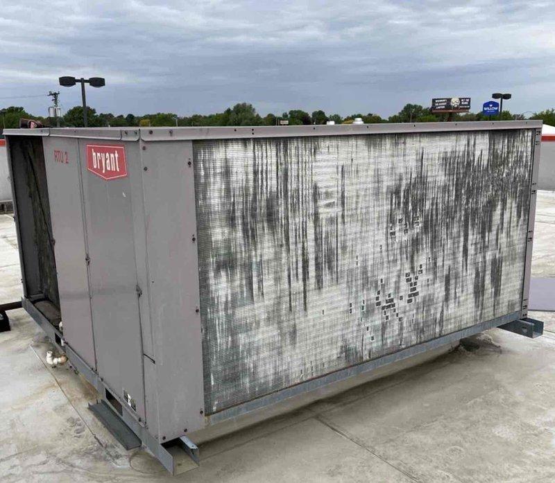 Responded to service call on commercial Bryant rooftop unit and diagnosed failed compressor 1 (Emerson Copeland Scroll Compressor model ZR72KCE-TF5-950). Successfully restored temporary cooling by bringing compressor 2 online while awaiting parts approval for compressor 1 replacement. Completed sold repairs including removal and replacement of plugged liquid line filter drier and replacement of faulty high pressure switch to restore proper refrigerant flow and system protection. Unit operational on single compressor pending authorization for failed compressor replacement and additional required components.