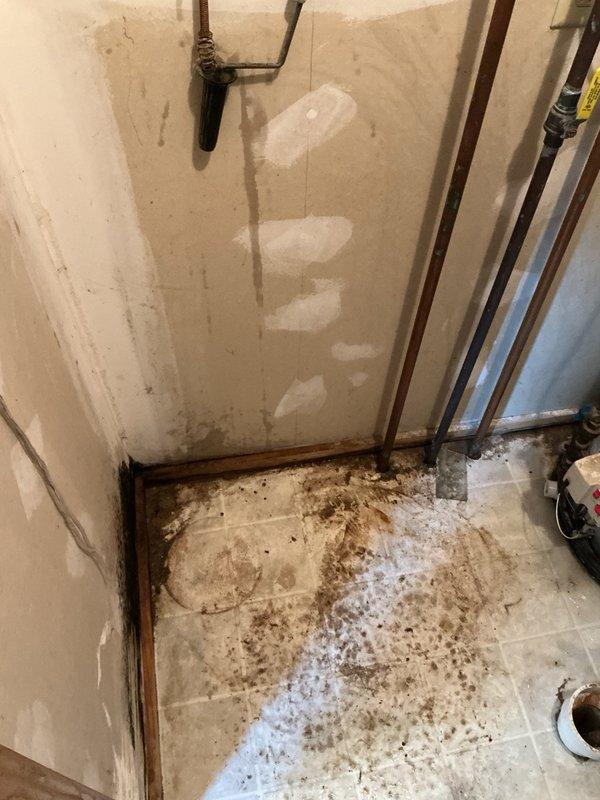 Responded to water softener leak in mechanical room. Upon inspection, determined the existing water softener unit was deteriorated beyond repair and actively leaking. Per homeowner's request to not replace the softener, removed the failed unit from the plumbing system. Cut out the old water softener assembly and installed 90-degree copper elbows to reconnect the supply and return lines, bypassing the softener location entirely. Restored water service to the residence and verified proper flow with no leaks at the new connections.