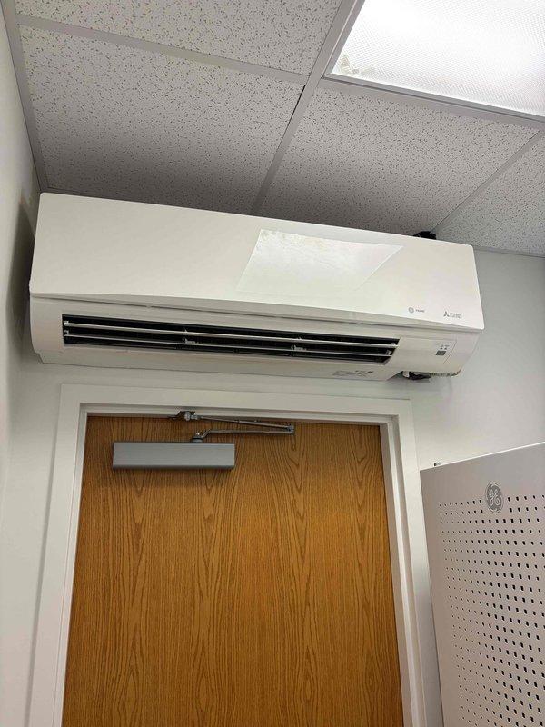Completed annual cooling maintenance on one 15-ton Carrier rooftop unit, two high wall-mounted mini-split heads, and one ceiling-mounted mini-split. Performed cooling and fan operation checks on all units, cleaned condenser coils on RTU and mini-split condensers, replaced filters on rooftop unit (4 - 24x24x4), and cleaned washable filters on all indoor mini-split heads. All equipment tested and operating within normal parameters.
