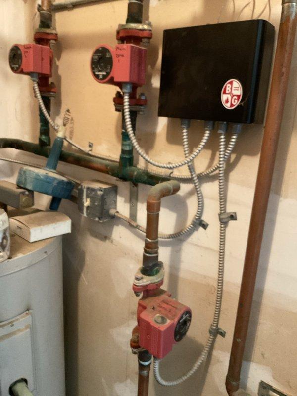 Completed comprehensive boiler tune-up including cleaning burners and flame sensor, and vacuuming debris from unit bottom. Diagnosed and replaced malfunctioning circulation pump serving bedroom zone due to pump failure. System tested and verified operational upon completion.