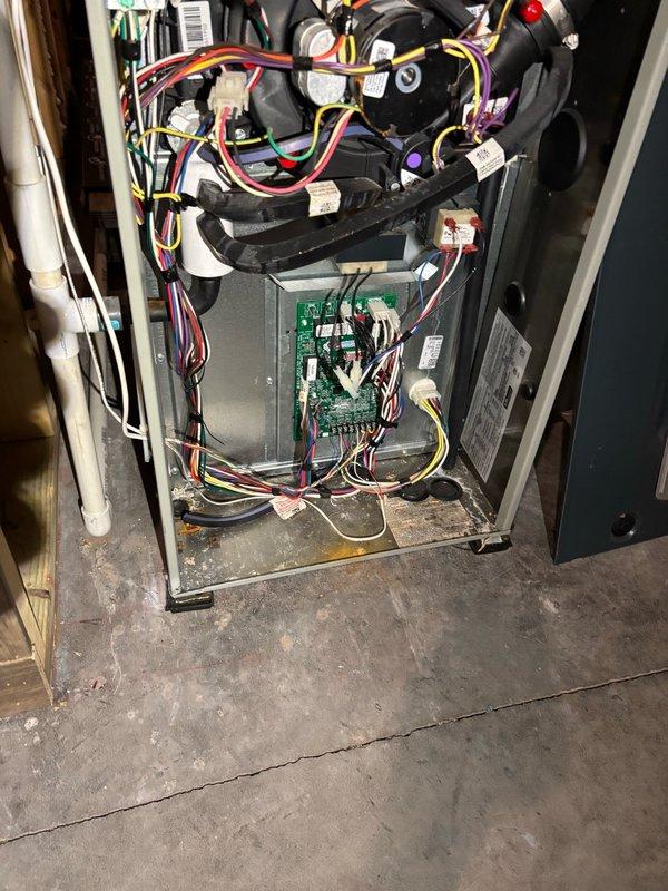 Completed comprehensive maintenance inspection on 2022 American Standard split system. Cooling system operating within specifications—TXV subcooling maintained steady at 10°F (range 9.8°F–11.2°F) over 10-minute observation period with 72°F outdoor ambient temperature; all electrical components tested and verified operational. Heating system evaluation revealed ignition failure with only one of three burners lighting despite proper HSI glow and gas valve operation. Diagnosed cause as rust and debris obstruction in burner carryover channels preventing flame propagation. Removed burner assembly, thoroughly cleaned all carryover ports, reinstalled burners, and verified full ignition sequence across all three burners with normal operation restored.