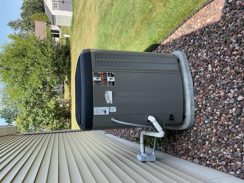 Completed preventative maintenance on a 3-year-old air conditioning system. Condenser coil was heavily obstructed with cottonwood debris and thoroughly rinsed clean to restore proper airflow. Verified thermostat settings, installed customer-supplied filter, and reset maintenance reminder for six-month interval.