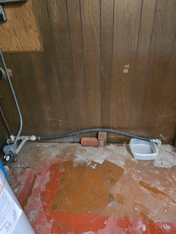 Responded to a basement water leak caused by a cracked barbed fitting on the well water supply line. Replaced the damaged barbed fitting and installed a new main shutoff valve on the pipe to provide proper water control and isolation capability for the well system.