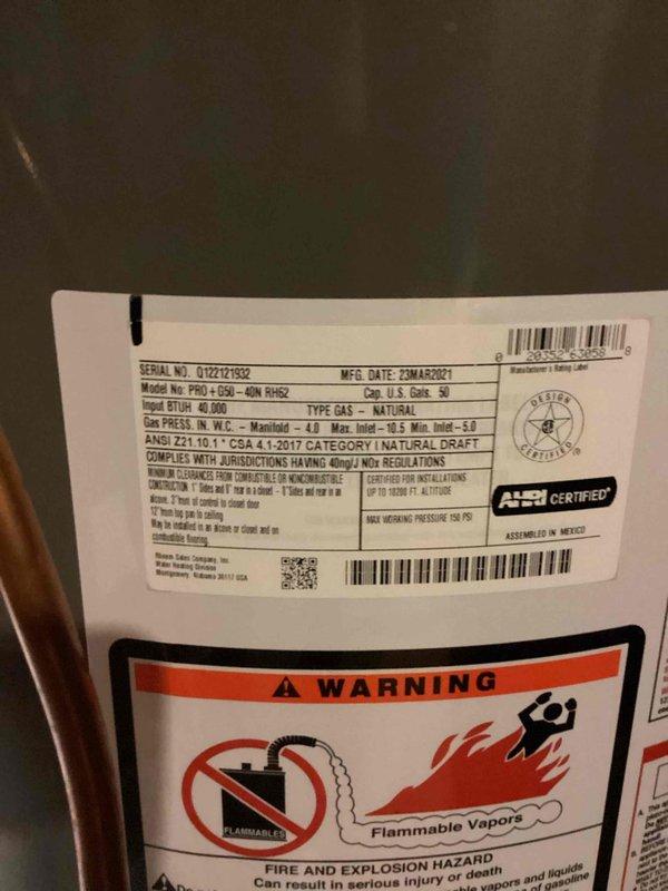 Responded to complaint of rotten egg smell in hot water from 50-gallon Rheem natural gas water heater (Model PRO+G30+XCN RH62, manufactured March 2021). Unit had never been flushed since installation. Performed water heater flush to remove sediment buildup and bacteria causing sulfur odor. Provided homeowner instruction on proper flushing procedure for future maintenance. Unit operational with adequate hot water supply throughout service.