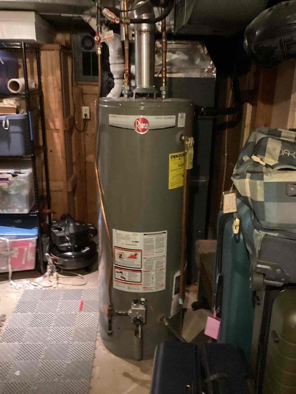Responded to complaint of rotten egg smell in hot water from 50-gallon Rheem natural gas water heater (Model PRO+G30+XCN RH62, manufactured March 2021). Unit had never been flushed since installation. Performed water heater flush to remove sediment buildup and bacteria causing sulfur odor. Provided homeowner instruction on proper flushing procedure for future maintenance. Unit operational with adequate hot water supply throughout service.