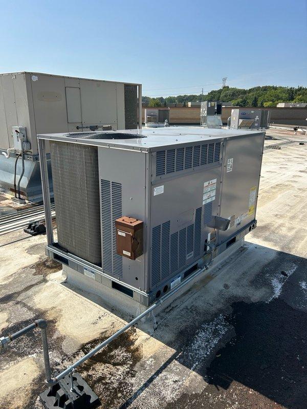 Completed annual cooling maintenance on three commercial rooftop units. Replaced all return air filters (4 ea. 18x24x2 and 8 ea. 16x16x2), cleaned condenser coils with water, cleared condensation drain lines, and inspected compressor and condenser fan motors. All units operating normally with proper cooling function verified; no issues found.