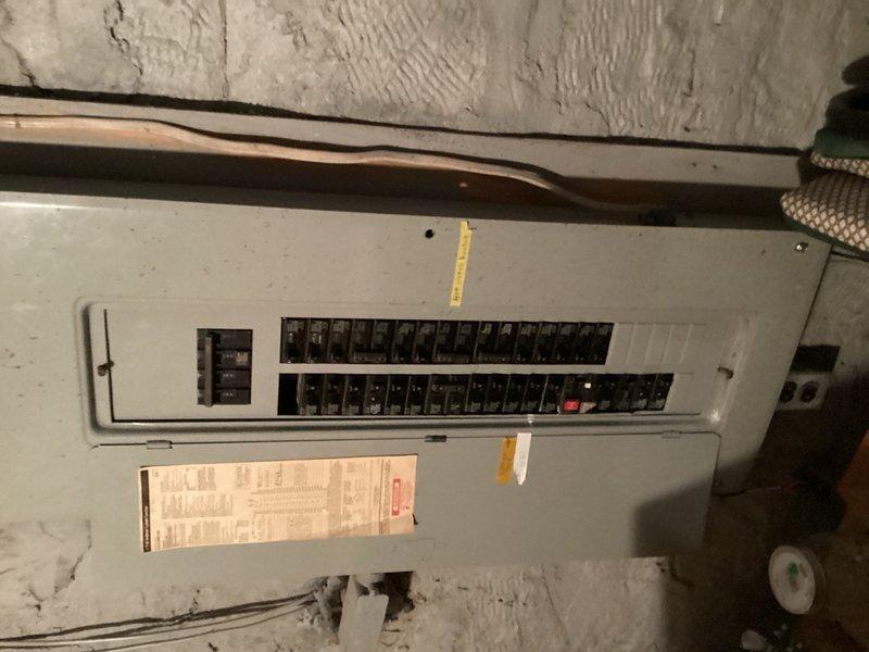 Responded to service call for water heater not producing hot water. Upon inspection, confirmed active leak from tank indicating internal failure. Assessed unit age and condition, documented existing installation in unfinished basement area with overhead utilities and electrical panel proximity. Provided replacement options and estimates to customer for new water heater installation due to failed tank beyond repair.