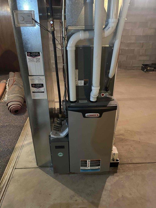 Completed annual maintenance on residential Lennox furnace and Lennox Elite air conditioning system. Performed comprehensive tune-up including cleaning of routine components on both units, thorough system testing, and operational verification. All equipment found to be functioning properly with no issues identified during inspection.