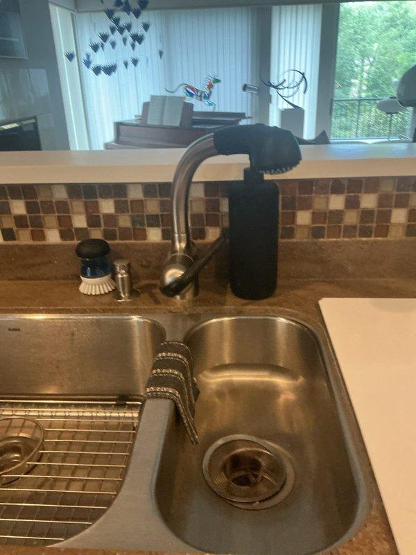 Responded to water leak service call at residential property. Installed customer-provided factory braided supply hose at kitchen sink faucet. Contacted customer en route to confirm arrival time, then returned to complete installation. Verified proper connection and tested for leaks to ensure system integrity.