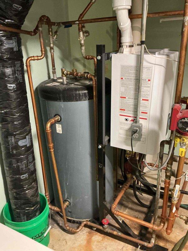 Responded to no cooling complaint on residential air conditioning unit approximately 5 years old. Upon arrival, observed condenser fan motor operating but compressor not running. Tested dual run capacitor and found compressor side reading significantly below manufacturer specifications. Temporarily connected known good capacitor to isolate component failure, but compressor still failed to start. Performed electrical diagnostics on compressor and confirmed internal short circuit within compressor windings. Explained findings to homeowner, including failed compressor requiring either compressor replacement or full system replacement. Homeowner requested time to obtain pricing estimates and evaluate repair versus replacement options before proceeding with work.