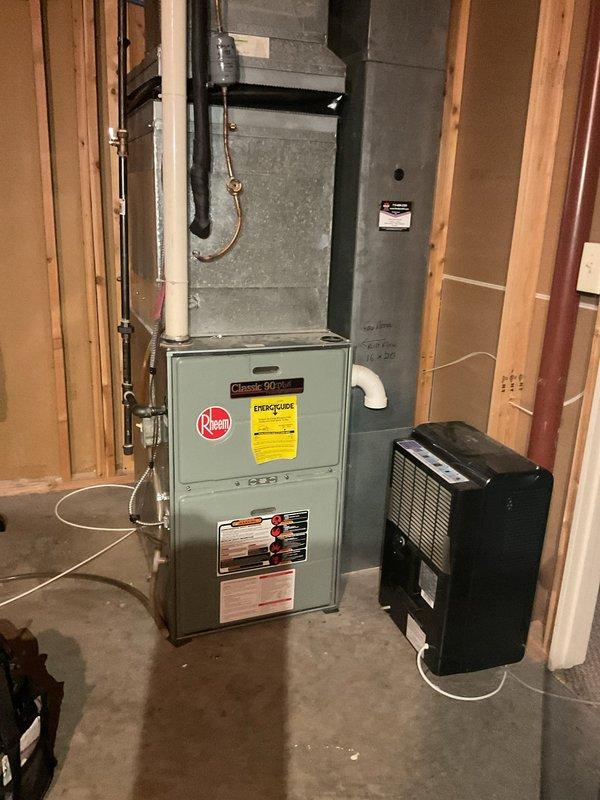 Completed comprehensive Family Rewards tune-up service on residential Rheem HVAC system including both furnace and air conditioning units. Performed full system inspection per maintenance agreement protocol, replaced failed AC contactor to restore proper compressor operation, and documented all findings on standard tune-up checklist form. No additional issues identified during inspection; system operating within normal parameters upon completion.